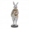 Dekorace králík v béžové košili držící zlaté vajíčko - 5*5*15 cm Barva: Béžová, multiMateriál: PolyresinHmotnost: 0,125 kg