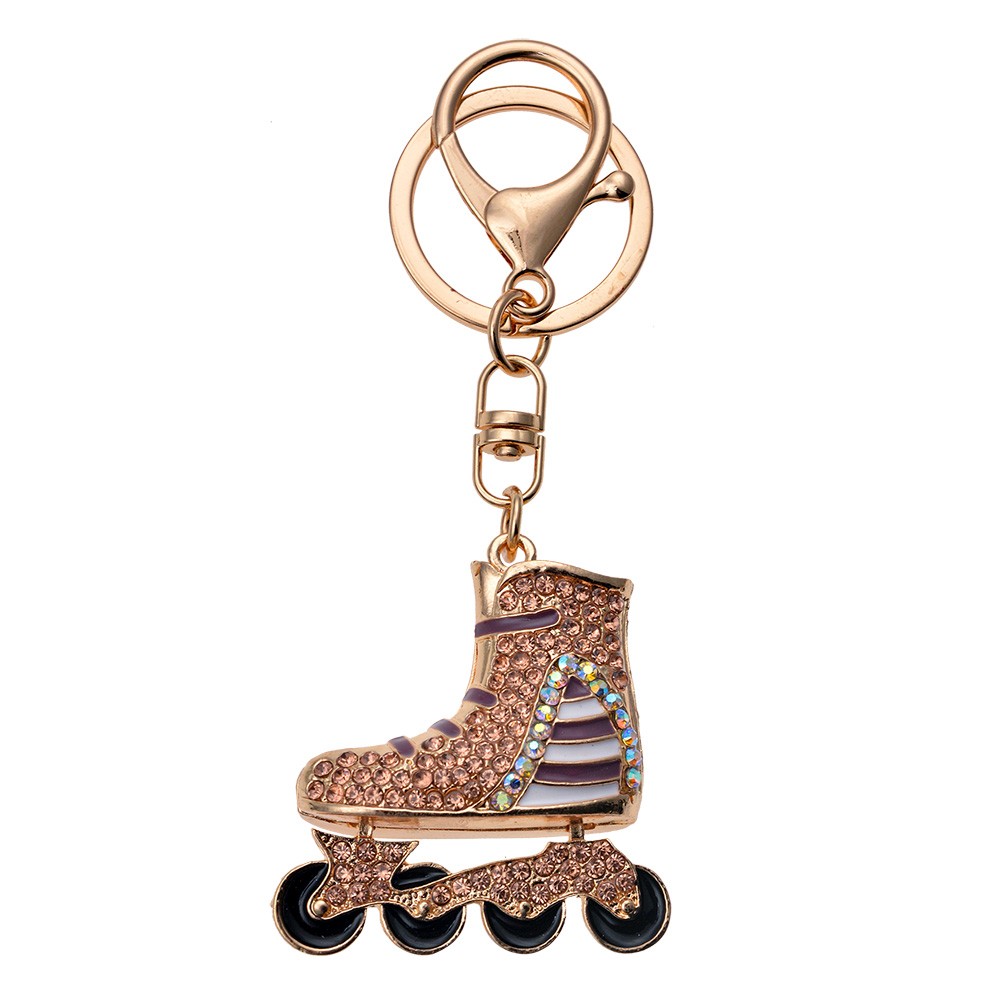 Zlatý přívěsek na klíče/ kabelku kolečková brusle s kamínky Clayre & Eef