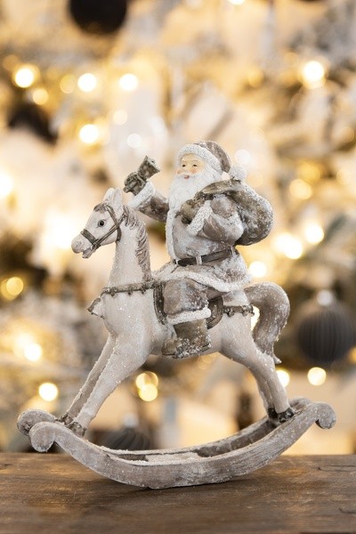 Dekorace Santa na houpacím koni s dárkem - 13*6*17 cm
