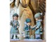 Zelená dekorace děvčátko se svíčkou a panenkou - 5*5*13 cm Clayre & Eef
