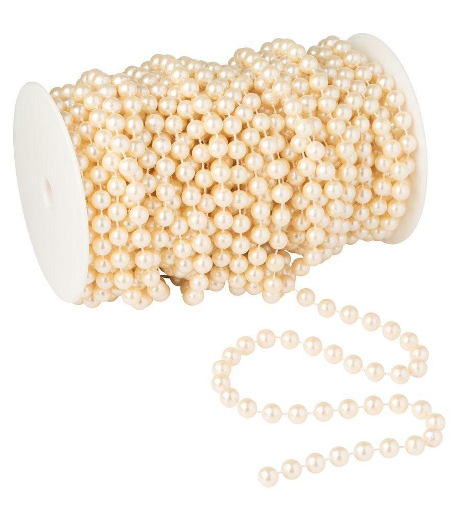 Béžová závěsná dekorativní girlanda z perliček v rolce - 11*11*18cm - 20 m J-Line by Jolipa Béžová závěsná dekorativní girlanda z perliček v rolce - 11*11*18cm - 20 m J-Line by Jolipa