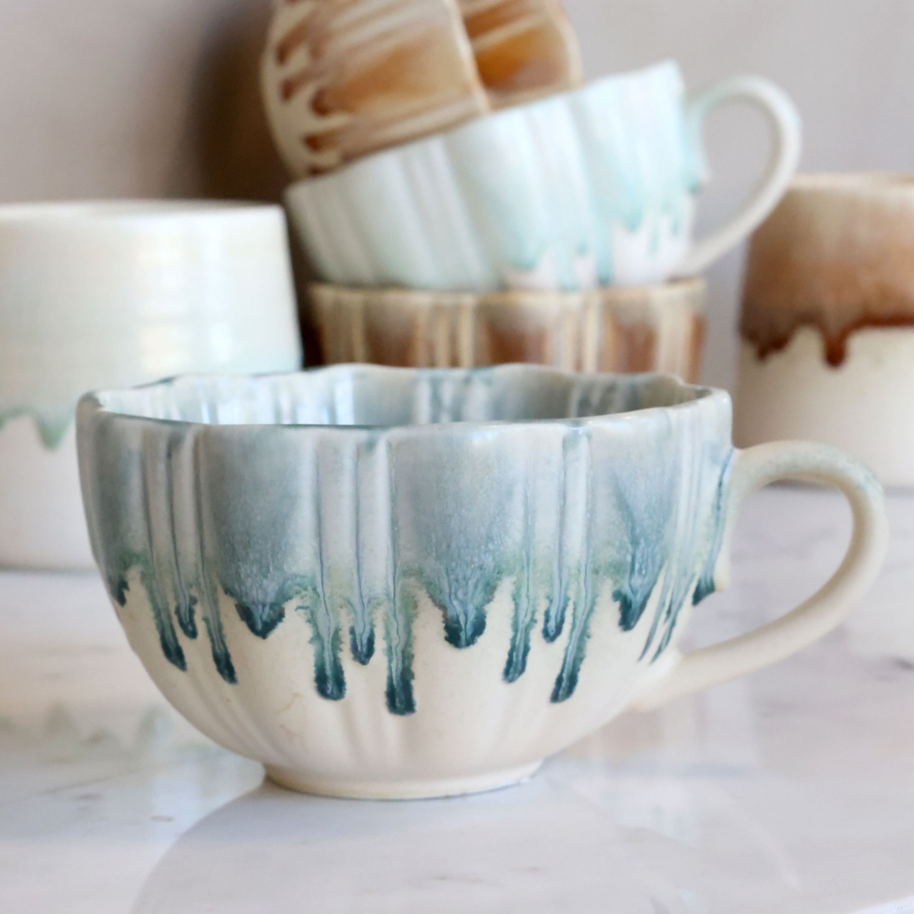 Porcelánový šálek se stékající glazurou New Bone China opálový – Ø 11*6,5 cm