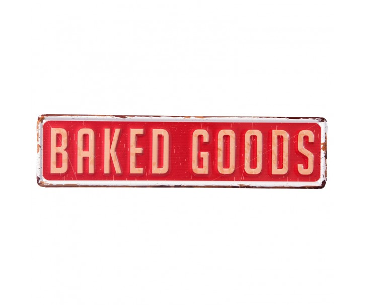 Červená kovová cedule BAKED GOODS s odřením a patinou.